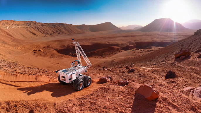 A Mars rover exploring the rocky terrain of the Martian surface, with distant craters and mountains under a bright sky.