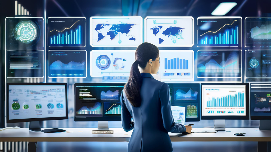 A businesswoman analyzing data on multiple digital screens, reviewing charts and metrics for business growth and efficiency.